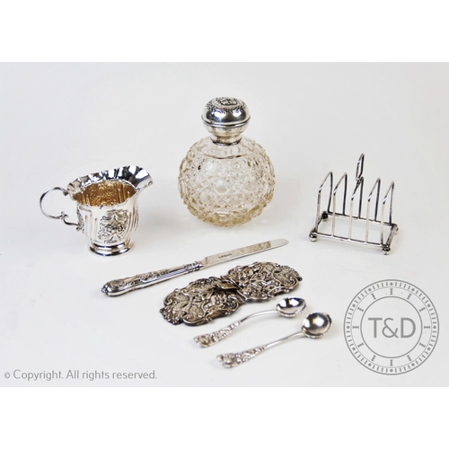 21 - A silver topped perfume bottle, Henry Matthews, Birmingham 1907, with globular cut glass body, 11cm ... 