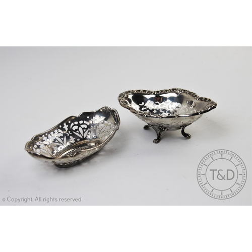 30 - A George V silver bonbon dish, William Neale, Birmigham 1911, of oval form with pierced decorations ... 