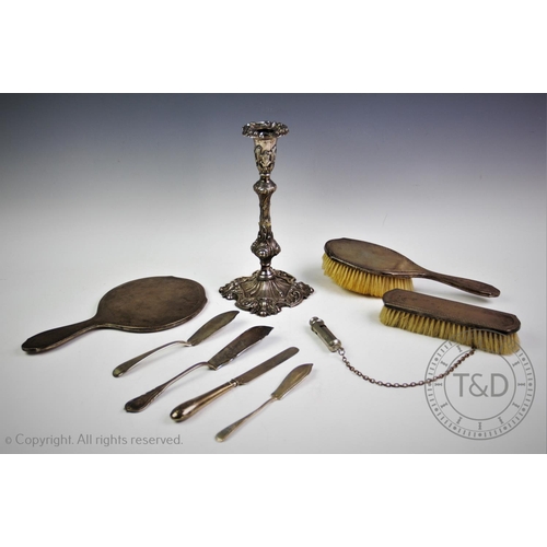 44 - A silver backed dressing table set, Henry Matthews, Birmingham 1924, comprising; two brushes and a h... 