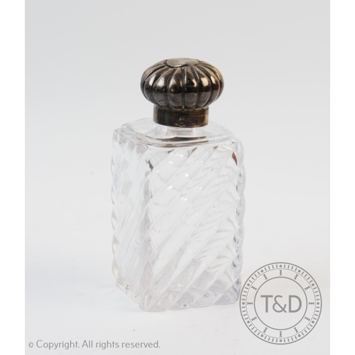 58 - A Victorian silver topped moulded glass scent bottle, Horton & Allday, Birmingham 1875, with star cu... 
