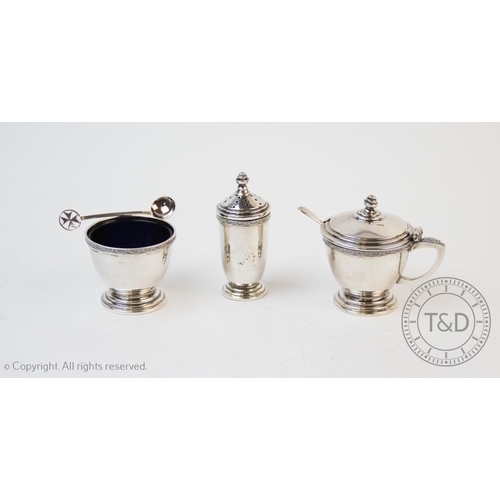 71 - A George V silver three piece condiment set, I S Greenberg & Co, Birmingham 1935, comprising; a wet ... 