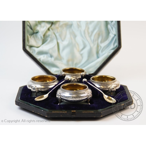 73 - A set of four Victorian silver salts, probably Joseph Angell II, London 1867, each of circular form,... 