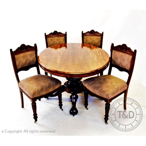 816 - A Victorian mahogany loo table, the oval moulded top raised upon an octagonal tapering shaft, with l... 