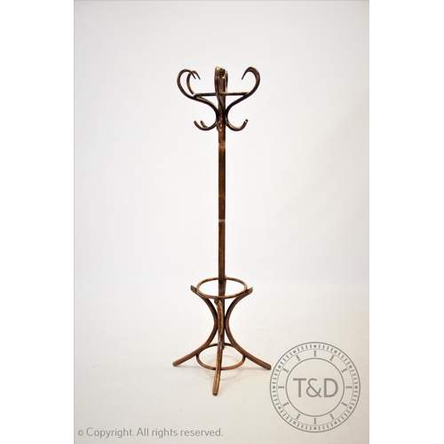 818 - A 20th century stained beech bentwood hat and coat stand, with six 'S' shaped hat hooks, upon a turn... 