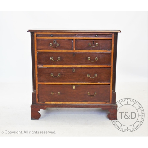 820 - A George III mahogany chest of drawers, the rectangular moulded top with rounded front corners above... 