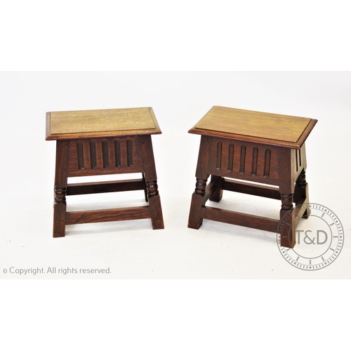 822 - A pair of 17th century style hinged oak joint stools, 20th century, each with a rectangular hinged c... 