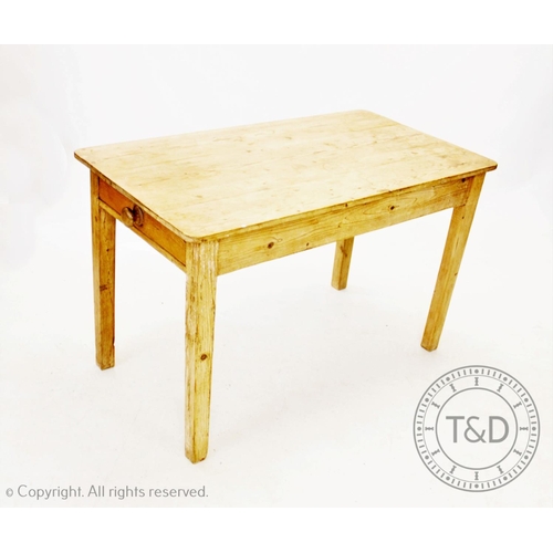 846 - A Victorian pine kitchen table, the rectangular plank top with rounded corners above a single frieze... 