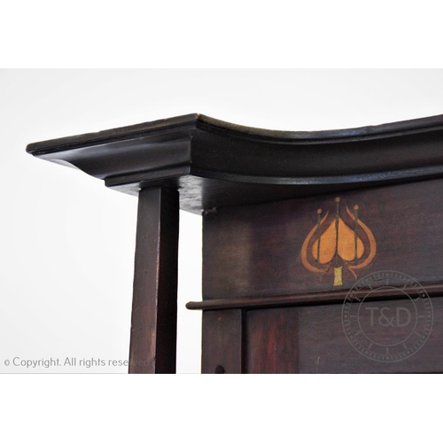 855 - An Art Nouveau mahogany freestanding corner display cabinet, circa 1900, in the Glasgow School style... 