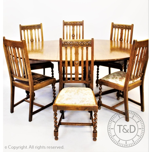 861 - A set of six oak lath back dining chairs, circa 1930, with drop in seats on barley twist front legs,... 