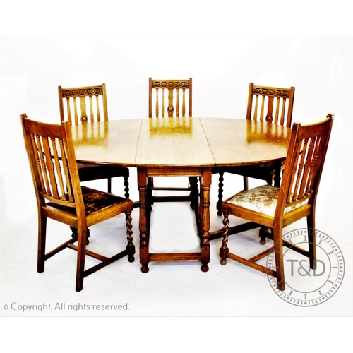 861 - A set of six oak lath back dining chairs, circa 1930, with drop in seats on barley twist front legs,... 