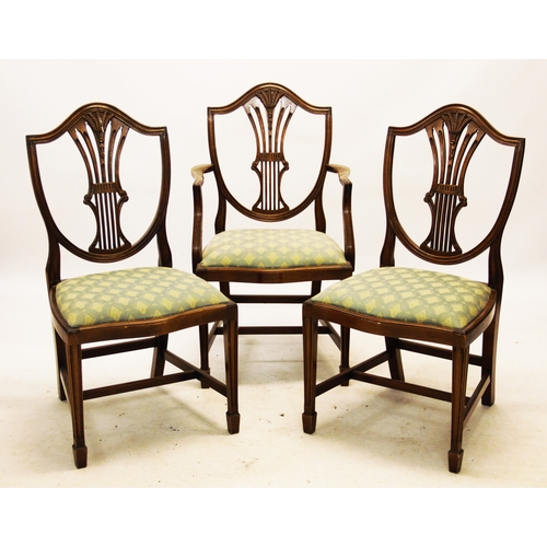 832 - A set of nine mahogany Hepplewhite style dining chairs, mid 20th century, each chair with a shield s... 