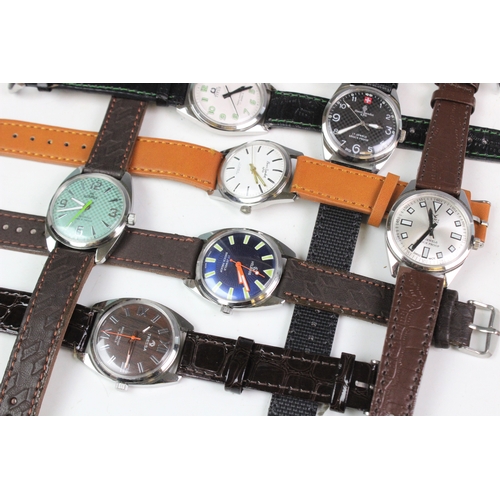 115A - A selection of eight gentleman's stainless steel 17 jewel wristwatches, including two by Henri Sando... 