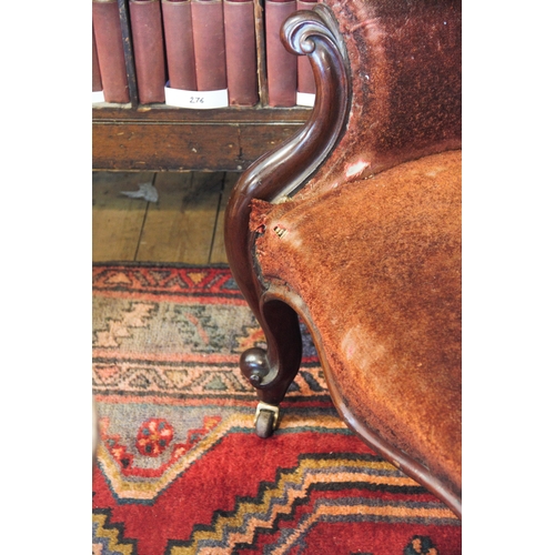 849 - A Victorian mahogany framed drawing room chair, the arched padded back above a serpentine seat flank... 