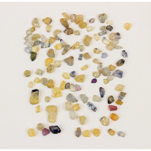 130 - Assorted rough natural gem fragments, to include approx. 246 carats of sapphires, approx. 34 carats ... 