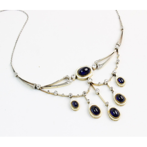 162 - An Edwardian sapphire, diamond and enamel festoon necklace, the white metal openwork swag design nec... 