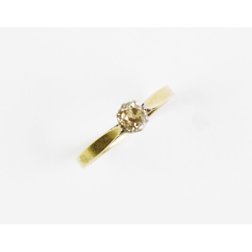 175 - A diamond solitaire ring, the central old cut diamond claw set in white metal, set to tapering yello... 