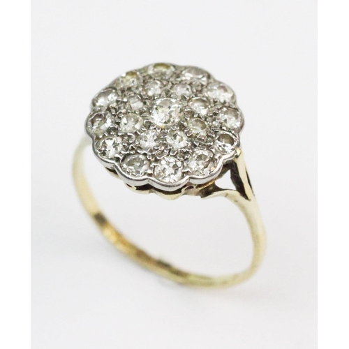 188 - A diamond set floral cluster ring, comprising, 21 old cut and single cut diamonds all set in a scall... 