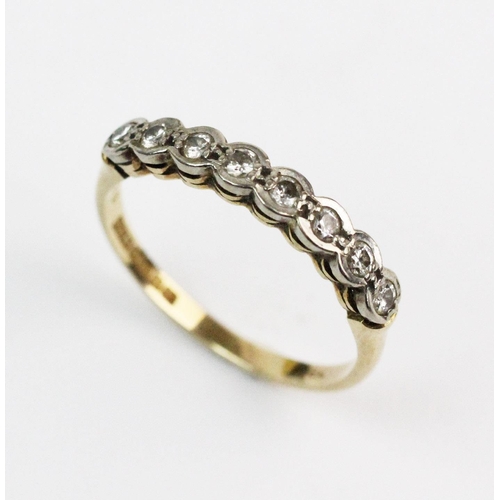 190 - A diamond set 18ct gold half-eternity ring, comprising eight  small brilliant cut diamonds claw set ... 