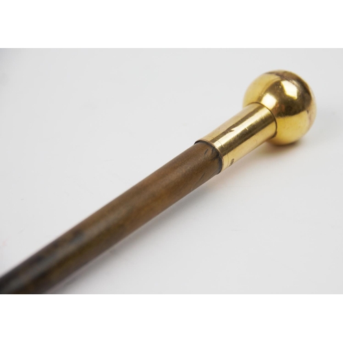 208 - In house bids only on this lot, An 18ct gold plate mounted Rhino horn swagger stick,  of slender tap... 