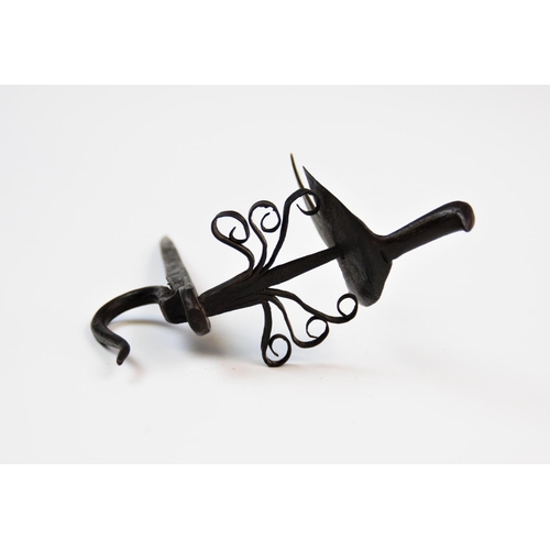 217 - A novelty wrought iron coat hook, the handcrafted design with stylised dove atop a tree, with nail w... 