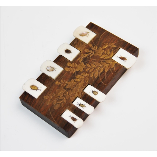 220 - A Japanese Shibayama rosewood whist counter, the rectangular body decorated with floral gilt spray, ... 