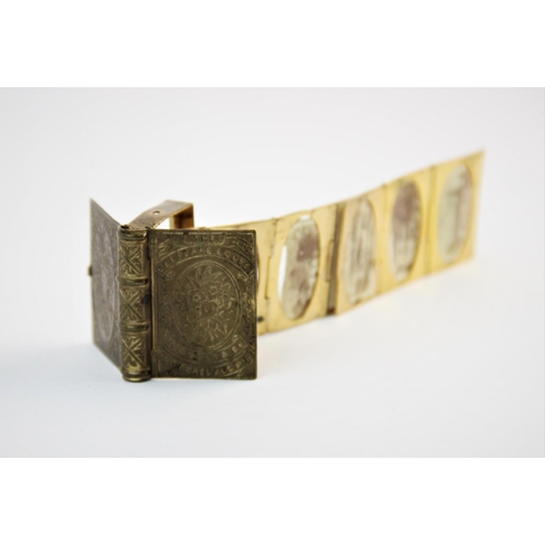 229 - A 19th century miniature gilt brass album, of rectangular form, the hinged cover decorated with flor... 