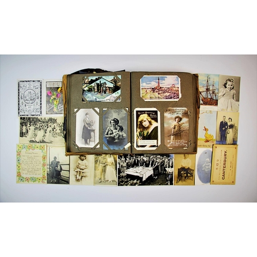 241 - A large postcard album, dated 1919, containing numerous mounted and unmounted postcards, with scenes... 