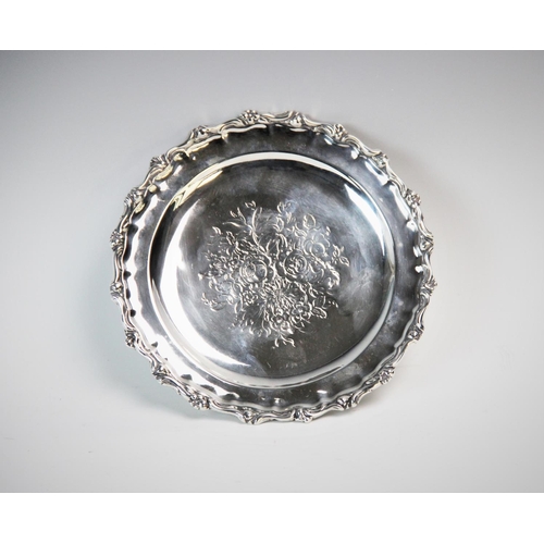 62 - A Victorian silver waiter, George John Richards, London 1848, of circular form, with scrolling folia... 