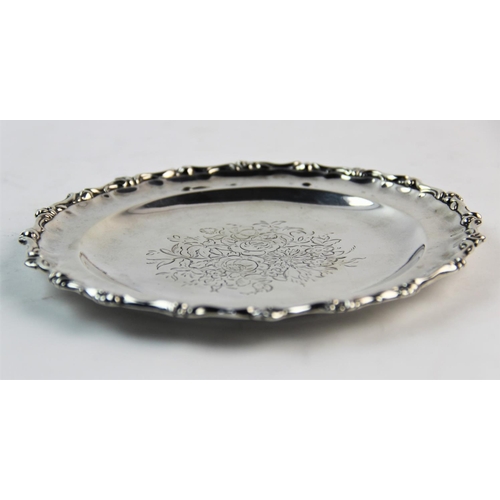 62 - A Victorian silver waiter, George John Richards, London 1848, of circular form, with scrolling folia... 