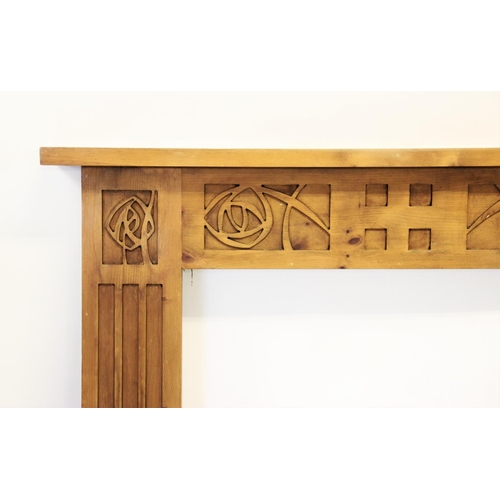 928 - A pine fire surround with Charles Rennie Mackintosh inspired design, with a rectangular mantel top a... 