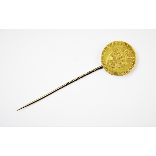 96 - A George III half gold spade guinea dated 1793, with attached soldered pin fitting, gross weight app... 