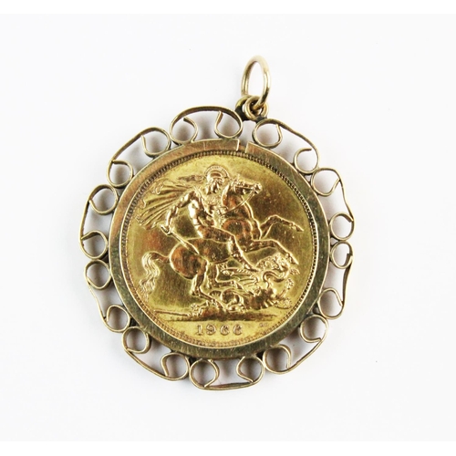 104 - An Elizabethan sovereign, dated 1966, set to a 9ct gold scroll design pendant mount, 3cm total diame... 