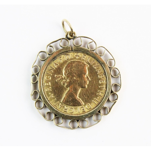 104 - An Elizabethan sovereign, dated 1966, set to a 9ct gold scroll design pendant mount, 3cm total diame... 