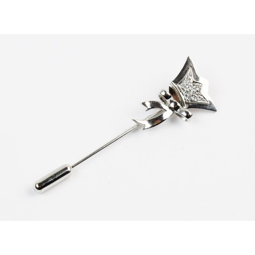 158 - A Lady Taveners lapel pin by Graff, comprising ten brilliant cut diamonds pave set to stylised silve... 