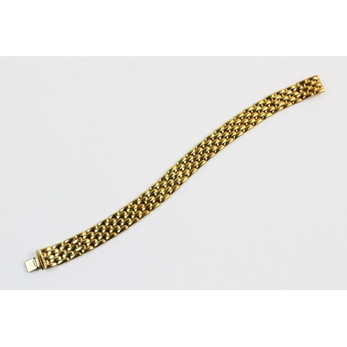 169 - An 18ct gold brick link bracelet, the plain polished bracelet approx. 1.2cm wide, 19cm long, tongue ... 