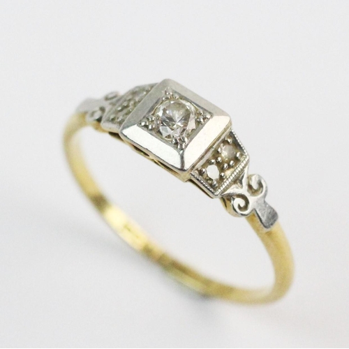 197 - An Art Deco style diamond set ring, comprising a central old cut diamond set to a square border surr... 