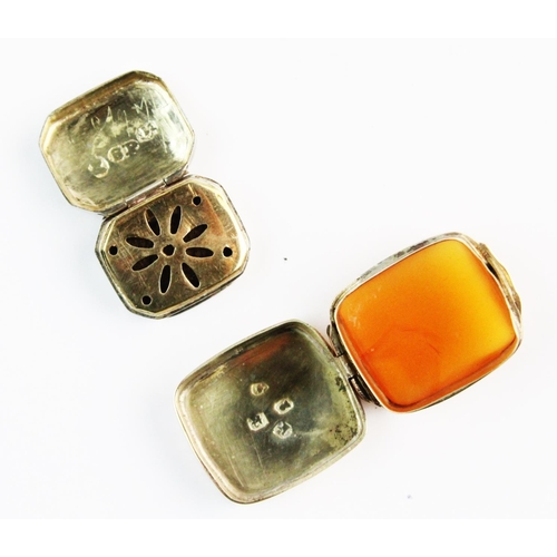 67 - A George IV gold coloured pill box, of rounded rectangular form, hinged lid set with an amber colour... 