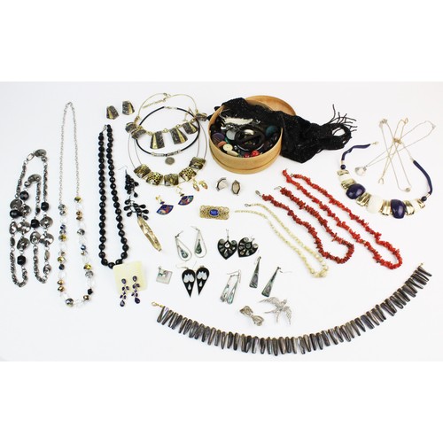 202 - A large quantity of vintage costume jewellery, watches and ephemera, to include, two coral beaded ne... 