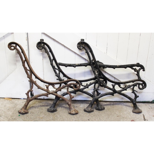 932 - A trio of 19th century Coalbrookdale style cast iron garden bench brackets, cast in the form of natu... 