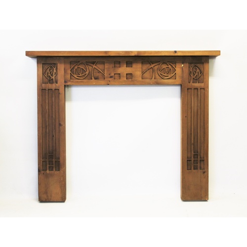 928 - A pine fire surround with Charles Rennie Mackintosh inspired design, with a rectangular mantel top a... 