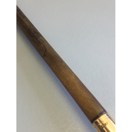 208 - In house bids only on this lot, An 18ct gold plate mounted Rhino horn swagger stick,  of slender tap... 