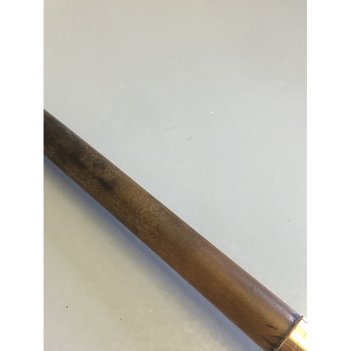 208 - In house bids only on this lot, An 18ct gold plate mounted Rhino horn swagger stick,  of slender tap... 