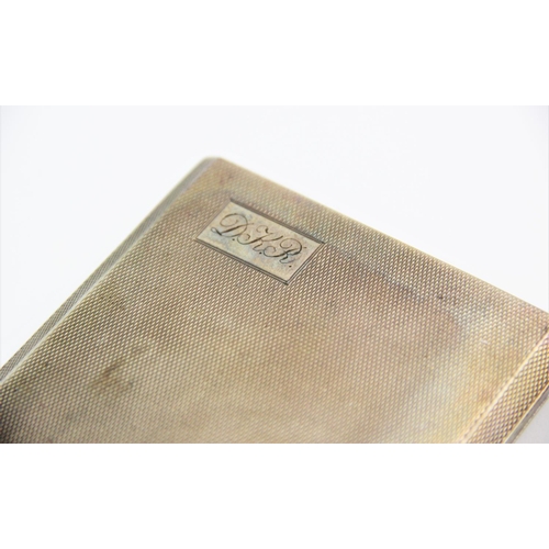1 - A George VI silver cigarette case, Walker & Hall, Sheffield 1951, of rectangular form, with engine t... 