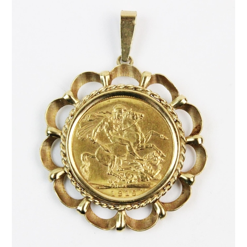 104 - A George V sovereign, dated 1915, complete in a 9ct gold pierced design pendant mount, gross weight ... 