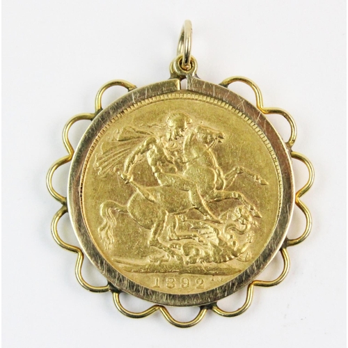 113 - A Victorian sovereign, dated 1892, set to a 9ct gold pierced design pendant mount, gross weight 9.4g... 