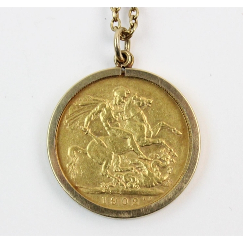 119 - An Edwardian sovereign, dated 1902, set to a 9ct gold pendant mount, suspended from a yellow metal c... 