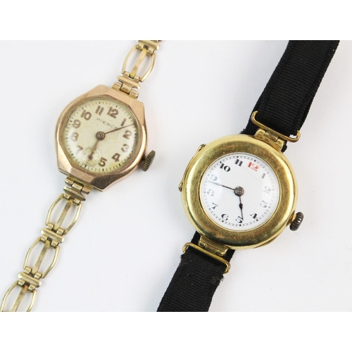 128 - A lady's continental 18ct gold vintage wristwatch, the round white dial with Arabic numerals, set to... 