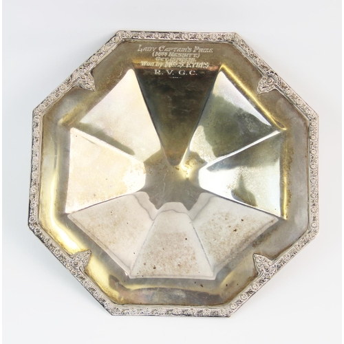 25 - A silver dish, Roberts & Belk Ltd, Sheffield 1960, of octagonal form, with foliate and floral raised... 