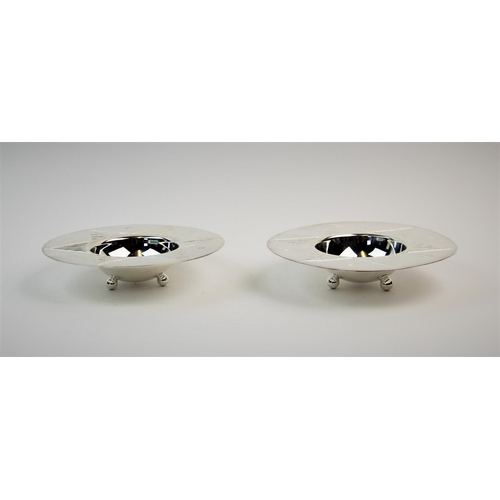 36 - A pair of silver 'Spirit of Chester' bowls, Lowe & Sons, Sheffield 2000, each circular bowl decorate... 