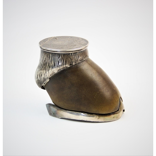 51 - An Edwardian silver mounted horse hoof desk inkwell, Elkington & Co Ltd, London 1910, the metal moun... 